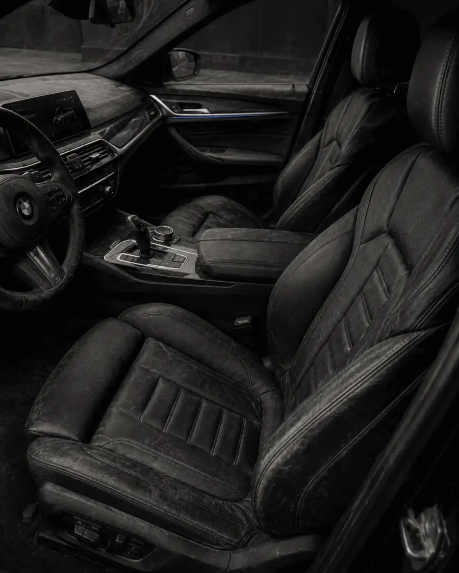 Dusty car interior before a detail (placeholder photo)
